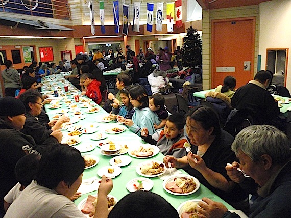 More than 100 staff and board members of Clyde River's Ilisaqsivik Society celebrated the holidays with their families Dec. 15 at their annual Christmas party which included plenty of food, fellowship and games. (PHOTO BY SHARI GEARHEARD, COURTESY OF ILISAQSIVIK)
