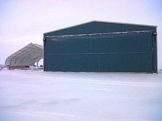 To handle its new medevac service in the Kitikmeot region, Aqsaqniq Airways Ltd. has built this temporary hangar at the Cambridge Bay airport, next door to one of the hangars built by Adlair Aviation, which formerly held the Government of Nunavut air ambulance contract in the region. (SUBMITTED PHOTO)