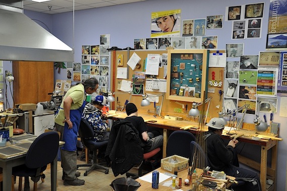 Lasocki watches over students at work. Lasocki said the jewellery/metalwork program attracts a lot of students who would otherwise skip school. (PHOTO BY SARAH ROGERS)