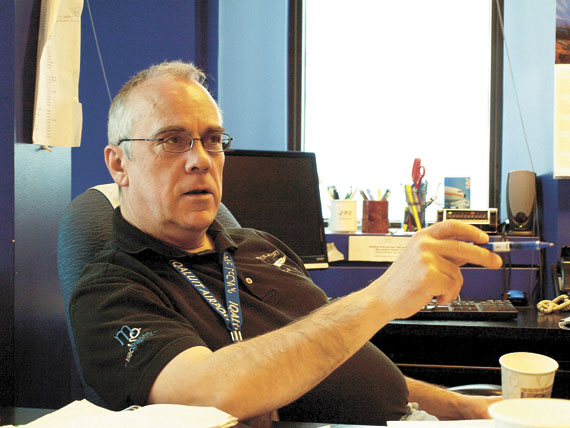 John Graham, Iqaluit’s airport manager, in the seat he’s occupied for the past 15 years, overseeing daily operations at the busiest airport in Nunavut. On Feb. 3, Graham will retire from his position to take a job with an as-yet unnamed private company. (PHOTO BY DEAN MORRISON)