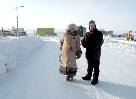 Nicole Ménard, Quebec's minister of tourism, left and Pierre Corbeil, minister of agriculture were in Nunavik and northern Quebec last week. The pair stopped in Umiujaq Jan.13, where they announced $300,000 for the community's new hotel (the yellow building in the background to the left.) The money flows from the province’s new assistance program aimed at developing tourism projects in northern Quebec under its Plan Nord. Umiujaq's new hotel will accomodate the visitors expected to come to the region once the nearby Tursujuq Park opens. (PHOTO COURTESY OF QUEBEC'S DEPT. OF TOURISM)