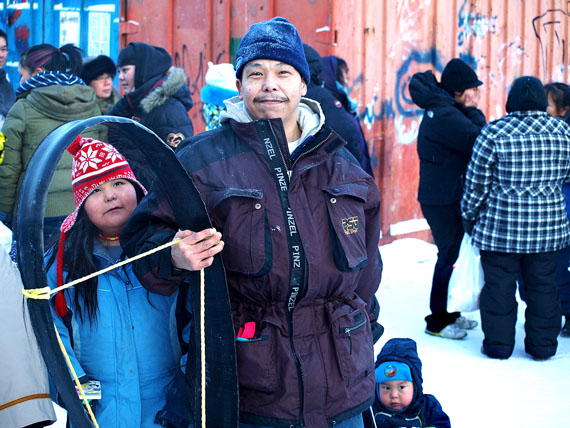 Pauloosie Pudloo, with daughter Brenda (left) and son Nicolas (right) stands with the baleen he was given as part of the Parlatsinik celebration held Jan. 2, behind Nakasuk Elementary School in Iqaluit. The celebration was held to honour people who caught their first animals in 2011. (PHOTO BY DEAN MORRISON)