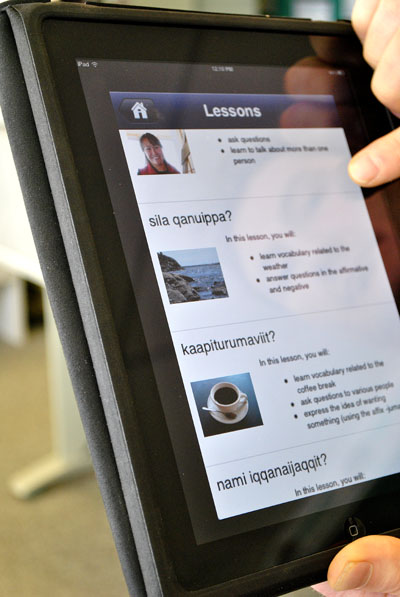 An Iqaluit iPad user views the Tusaalanga app. (PHOTO BY JIM BELL)