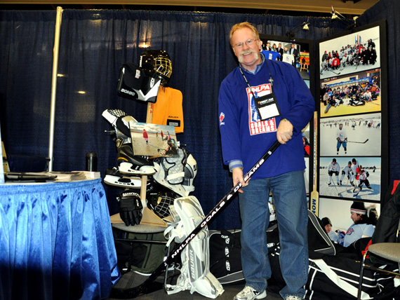 Jeff Turner, a volunteer with Project North, draws sponsors to his booth at the Northern Lights trade show last weekend. The Ottawa-based organization has just launched it lastest fundraising drive, called Gear Up, which allows sponsors to donate a piece of hockey equipment - or even the full bag - to be shipped to children in Nunavut communities. Read more about it at www.nunatsiaqonline.ca. (PHOTO BY SARAH ROGERS)