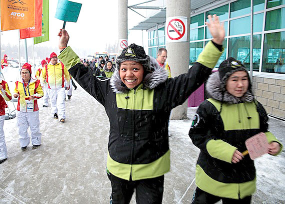 This member of Team Nunavik, dressed in her black and green team outfit, gets ready to enter the March 4 opening ceremonies for the Arctic Winter Games in Whitehorse, Yukon. More than 2,000 athletes will vie for a golden ulu during the 22nd AWG. The week-long event, which draws teams from around the Arctic participating in indoor and outdoor events, includes everything from badminton to Arctic games. (PHOTO COURTESY OF MAKIVIK MAGAZINE)