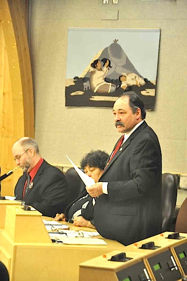 In the winter session of the Nunavut legislature, Tununiq MLA Joe Enook tables a series of letters about suicide from Pond Inlet high school students. (PHOTO BY SARAH ROGERS)