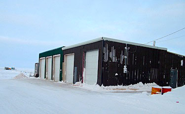 Here's what Rankin Inlet MLA Tagak Curley was referring to March 5 in the Nunavut legislature's committee of the whole: Sudliq Developments Inc. built a heated garage in Coral Harbour so that the fuel trucks used to fulfill its Government of Nunavut fuel contract would stay warm during the winter months. But Sudliq lost the contract last autumn, and despite a favourable appeal from the Nunavummi Nangminiqaqtunik Ikajuuti appeals board, didn't see a new Request for Proposals re-opened. (FILE PHOTO)