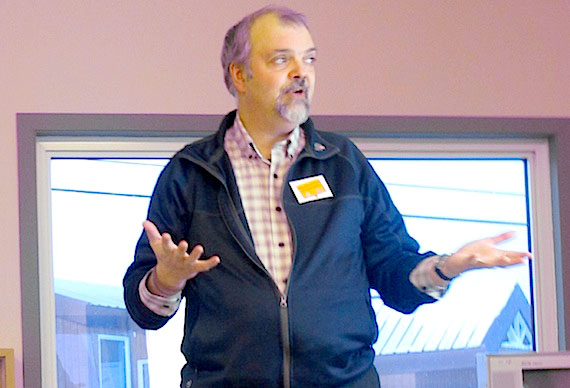 Doug Workman, the president of the Nunavut Employees Union, talks to about 30 union members in Cambridge Bay March 14 about the union's current negotiations with the Government of Nunavut and what to expect next. This past fall, 85 per cent of NEU members who cast ballots voted in favour of strike action, if necessary. Mediation talks, which began Feb. 17 in Iqaluit, failed to break the impasse. This means that as soon as the two sides reach an agreement on the provision of emergency services during a labour disruption, the union may take legal strike action. Workman wouldn't comment on the timing of a possible strike date, because such an essential services agreement is not yet in place. The Government of Nunavut, in a statement March 15, said that under the Public Service Act, the GN may not lock out its unionized workers. (PHOTO BY RED SUN PRODUCTIONS)