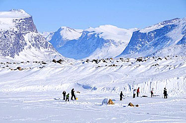 Children play hockey on the Duval River in Pangnirtung where David Kilabuk used to play as a child. (PHOTO BY DAVID KILABUK)