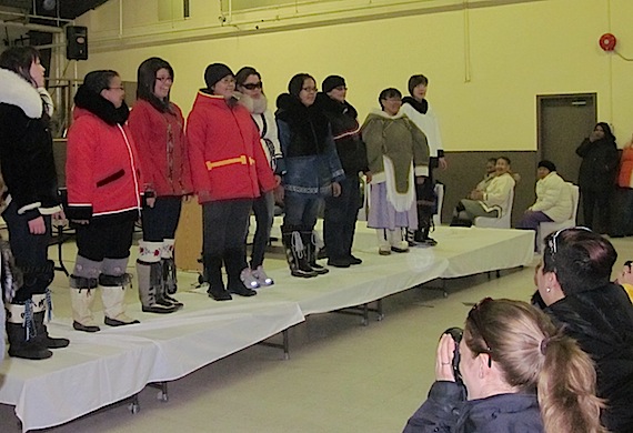 Participants in the Nunavut Literacy Council's Miqqut program, show off their creations at a gala fashion show in Rankin Inlet on May 1. From left to right: Victoria Kakuktinniq, Manitok Aliyak, Tara Green, Nina Bruce, Geralyn Qutik Kaludjak, Rose Ann Kasadluak, Brenda Aupilardjuk, Katherine Makkigak, and Aqpa Tattuinee. (PHOTO COURTESY OF MIQQUT)