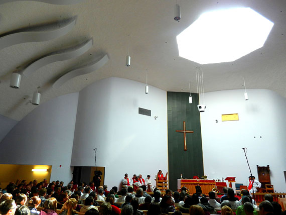 The interior of the reconstructed St. Jude's Cathedral in Iqaluit, which was officially dedicated in a service held June 3, closely resembles the building that was gutted by fire in 2005. One distinctive feature is the oculus, or skylight, that sits about 40 feet above the nave, the part of the church where the congregation sits. Regular church services will start next Sunday, June 10, with an English service at 9:45 a.m. and Inuktitut at 11:00 a.m. (PHOTO BY JIM BELL)