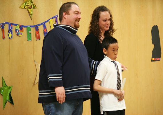 Grade 5 graduate Tommy Michael picks up his diploma at Apex's Nanook Elementary School graduation ceremony on June 19. He'll be moving on to Grade 6 and middle school with four others next year.