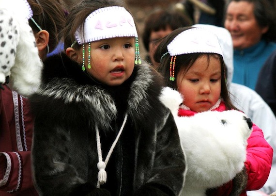 These girls are dressed up for the Celebration of the Seal festivities June 22 in Iqaluit. Many who attended the celebration, held from 6 p.m. to 9 p.m. in Sylvia Grinnell territorial park, wore sealskin clothing — and everyone feasted on fresh seal. To see more photos, go to Nunatsiaq News' Facebook photo album at http://on.fb.me/NtAA8g. (PHOTO BY DAVID MURPHY)
