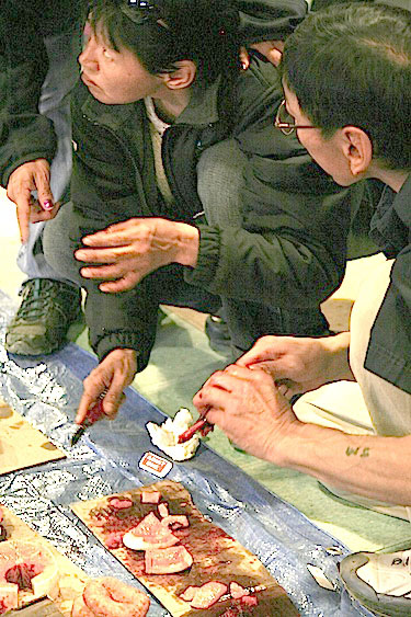 A June 28 feast at the Anglican Parish Hall in Iqaluit included country food — and information on why women of child-bearing age shouldn't consume ringed seal liver. (PHOTO BY DAVID MURPHY)