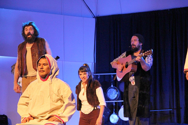 Performers with the Timber circus show play music before a full house at the Nakasuk School gym June 30 during an evening show. (PHOTO BY SAMANTHA DAWSON)