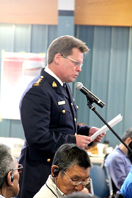 Chief-Supt. Steve McVarnock, the commanding officer of Nunavut’s “V” division of the RCMP, gives a presentation to the Nunavut Impact Review Board during final public hearings July 20 on the Mary River iron ore project July 20. (PHOTO BY SAMANTHA DAWSON)