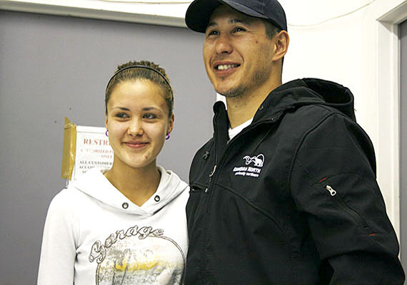 Amanda Eeyeevadluk, 17, stands with NHL star Jordin Tootoo June 30 in Iqaluit. It was Tootoo's last stop on a promotional tour for Norterra and Canadian North. On July 1, Tootoo announced he’s leaving the Nashville Predators to play for the Detroit Red Wings. (PHOTO BY DAVID MURPHY)