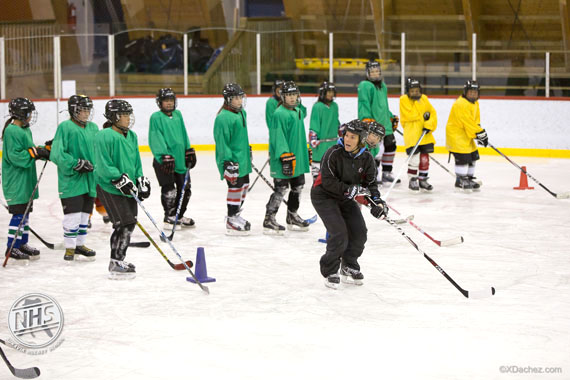 Youth in Inukjuak practice at the local rink in a program run under the Nunavik Youth Hockey Development Program. (PHOTO COURTESY OF XAVIER DACHEZ)