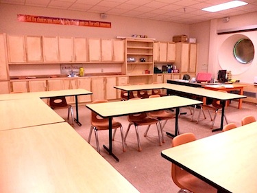 A renovated classroom in Iqaluit's Inuksuk high school now includes new desks and chairs chosen by the school. And each classroom is equipped with an interactive smart board teaching tool. (PHOTO BY SAMANTHA DAWSON) 