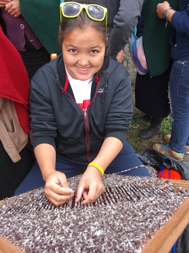 Leanna Angnatuk learns to make a poncho with a women's group called Sumak Ahuana in the community of Santa Anita. (PHOTO BY LOUISA WHITELY-TUKKIAPIK)