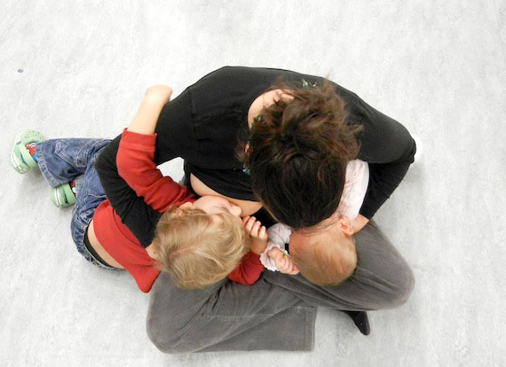 Becca Raper of Cambridge Bay breast feeds her children, Mo and Vaylea, at the community's Sept. 28 annual breastfeeding challenge, held in advance of National Breastfeeding Week, Oct. 1 to Oct. 7. About six in 10 Nunavut women breast feed their babies over some period of time, says the Inuit Child Health Survey for Nunavut. But only one in three were exclusively breast fed for six months, the period recommended by the World Health Organization. Similar breastfeeding challenges will be take place during National Breastfeeding Week in other Nunavut communities, including Rankin Inlet where the Pulaarvik Kablu Friendship Centre plans to host a challenge on Oct. 5. (PHOTO BY JANE GEORGE)