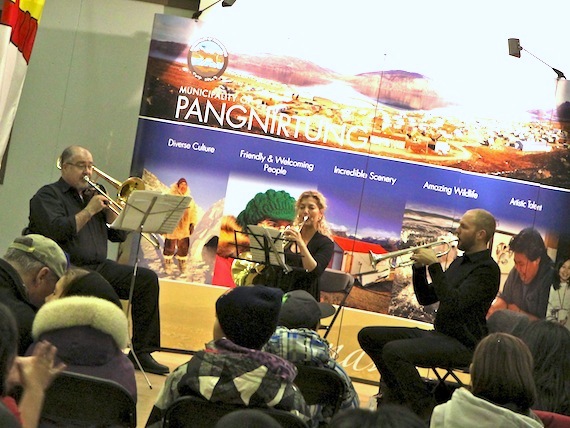 A trio of musicians from the National Arts Centre orchestra perform Oct. 23 at the community centre in Pangnirtung. Their schedule in the community also included music workshops with the high school students, followed by two concerts, at Alookie elementary school, Attagoyuk high school. The full Ottawa-based National Arts Centre orchestra plays Oct. 27 at Nakasuk School in Iqaluit. The concert in Iqaluit, performed by a 20-person orchestra, will feature throat-singing, traditional songs, a performance of Vivaldi’s Four Seasons and pieces by two renowned Nordic composers, Edvard Grieg of Norway and Jean Sibelius of Finland. (PHOTO BY SARAH MCMAHON)