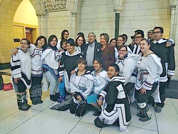Students from the Ottawa-based Nunavut Sivuniksavut college program surround Indspire 2013 award recipients Charlie Evalik and Elizabeth Zarpa outside the House of Commons on Oct. 16. Read more about this year's recipients of awards from Indspire, formerly known as the National Aboriginal Achievement Awards, on Nunatsiaqonline.ca. (PHOTO COURTESY OF NS)