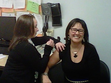 Federal health minister and Nunavut MP Leona Aglukkaq receives her annual flu shot Nov. 15 in Baker Lake. (HANDOUT PHOTO)