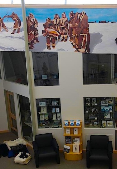 The finished mural overlooks the ground floor of the May Hakongak Library and Cultural Centre in Cambridge Bay. (PHOTO COURTESY OF THE KITIKMEOT HISTORICAL SOCIETY)