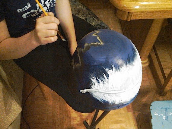 Presley Taylor, 16, of Cambridge Bay decorates a helmet she called “Freedom,” which helped a foundation called “True Patriot Love” raise money for members of the military and their families. Read more about her helmet designing effort on Nunatsiaqonline.ca (PHOTO BY K. TAYLOR)
