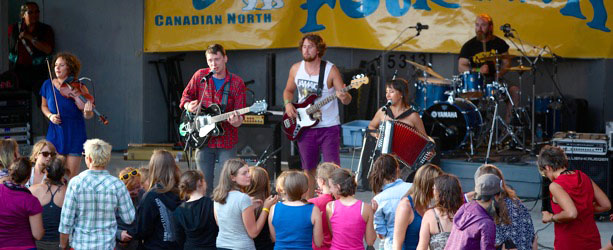 The Jerry Cans — Andrew Morrison, on guitar and vocals, Brendan Doherty on bass, Nancy Mike, who plays accordion and throat sings, Gina Burgess on violin and Steve Rigby on drums — play a concert at Yellowknife’s Folk on the Rocks Festival this past July. The band is getting ready for a CD release show Jan. 19, their first performance in six months, at the Iqaluit Legion. (PHOTO COURTESY ANDREW MORRISON)