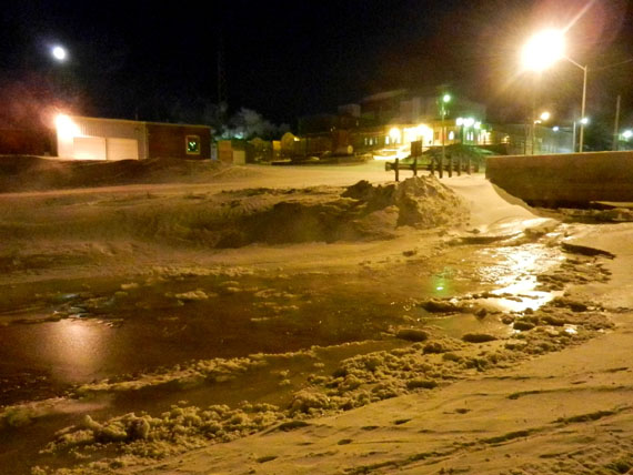 Water from a broken pipe at Inuksuk High School flowing down the creek between the high rise complex and the old hospital at about 6:50 a.m. Jan. 13.