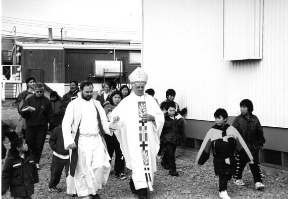 Father Tony Krótki and Bishop Reynald Rouleau bless the new Catholic Church in Kugaaruk, September 1999. Read more on Nunatsiaqonline.ca about the appointment of Krótki as bishop of Churchill-Hudson Bay, to replace Rouleau, who is retiring after 25 years in the position. (PHOTO COURTESY OF THE DIOCESE OF CHURCHILL-HUDSON BAY)