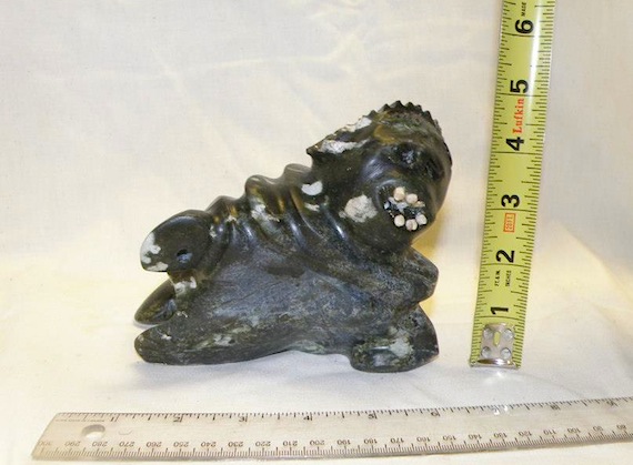 This carving of Sedna is back on display at the offices of the Government of Nunavut's Executive and Intergovernmental Affairs after being stolen Feb. 11. A man later tried to sell the carving at Iqaluit's Elks Club, but, after being challenged about where the carving came from, he ended up giving it to the prospective buyer and leaving the club. The carving was one of six carvings worth thousands of dollars which were stolen Feb. 11 from the EIA offices at the Astroplex. Another large carving of an eagle was bought by an unsuspecting art lover for $40. Due to photos posted on Facebook and flyers circulated around town, the EIA has recovered all but two of the missing pieces. Still at large: a necklace and a giant-sized muskox.