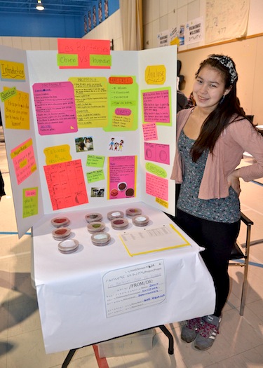 Anne Sequaluk of Kuujjuaq stands beside her prize-winning project