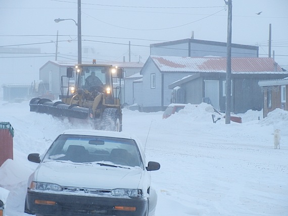 A City of Iqaluit snow plow starts to clear streets around Iqaluit's Lower Base area early on March 12. 