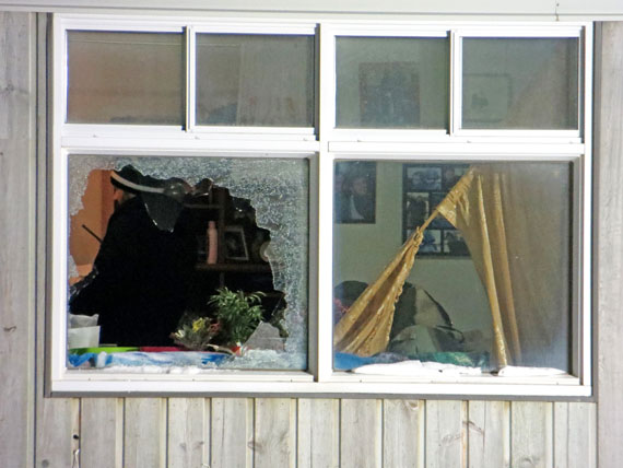 Shattered windows at 1080 Chopper Crescent in Kuujjuaq, following the violent standoff that took place March 2 and 3 inside this house, which started when an armed man shot and killed Steve Dery, a young Kativik Regional Police Force officer, and wounded his partner, Joshua Boreland. “We are all deeply affected by the loss of Steve Dery who was killed on duty at the age of 27. We also feel and share the pain of Joshua Boreland, who was injured alongside Steve; he will remember this event for the rest of his life,” said a March 4 statement from the Nunavik Police Association, the union which represents KRPF officers. Read what the association said on Nunatsiaqonline.ca. (SUBMITTED PHOTO)
