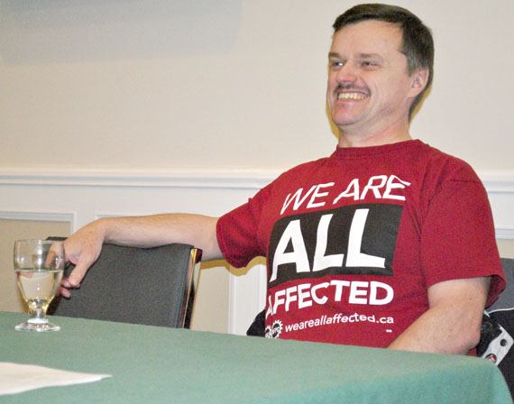 Geoff Ryan, an NDP supporter who serves as an official with the Public Service Alliance of Canada, said the Harper government sees “the redistribution of wealth as redistribution from families to corporations.” (PHOTO BY JIM BELL)