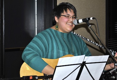 Terrie Kusugak sings at the March 23 fundraiser for the Iqaluit-based Kamatsiaqtut help line. (PHOTO BY JANE GEORGE)