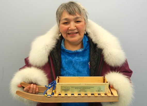 Navalik Helen Tologanak, president of 1984 Nunavut, holds the Murray Pyke Award trophy she accepted April 11 at the Nunavut Mining Symposium's gala award celebration. The award, named after a geologist known for his outstanding work in the North, was awarded to 1984 Nunavut for 