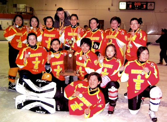 Team Kivalliq strikes a victory pose after winning Nunavut’s first territorial female hockey championship at Iqaluit’s Arnaitok Arena, March 31. They narrowly defeated Team Baffin 9-8 to take gold. (PHOTO BY PETER VARGA)