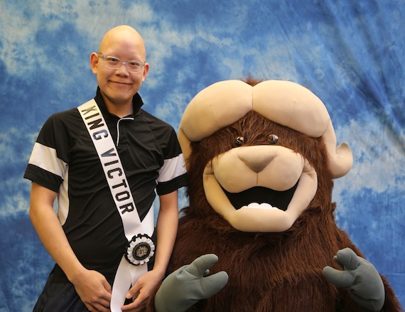Kyle Tuktimak, dubbed King Victor of the Omingmak Frolics, poses with Ollie the muskox May 18 in Cambridge Bay. See more Frolics photos later on Nunatsiaqonline.ca and on the Nunatsiaq News Facebook bage. (PHOTO BY RED SUN PRODUCTIONS)