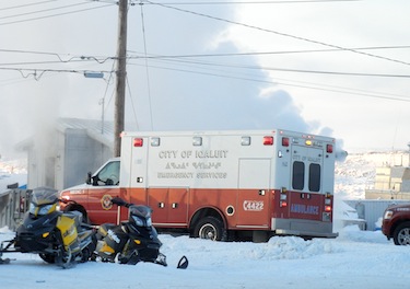 A City of Iqaluit ambulance van responds to a fire this past February. The new ambulance that the City plans to purchase will be mounted on a truck. (FILE PHOTO)