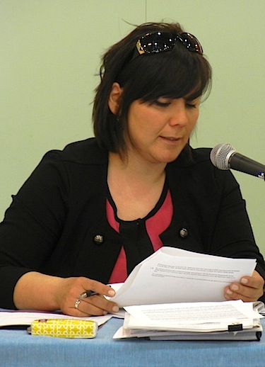 Elizabeth Annahatak, president of Nunavik's Saputiit Youth Association, reads a report May 27 at the Kativik Regional Government council meeting in Kangiqsujuaq. (PHOTO BY JANE GEORGE)