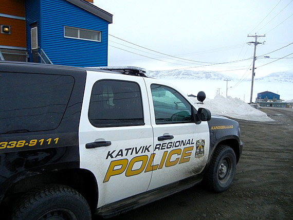 A Kativik Regional Police Force truck idles in front of the police station in Kangiqsujuaq. This community's two police members are new hires, similar to many in the force, which has lost more than half its members since the beginning of 2013. Read more about the region's police force on Nunatsiaqonline.ca. (PHOTO BY JANE GEORGE)