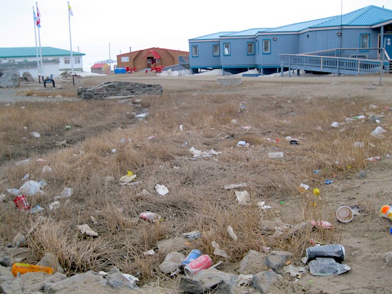 With the arrival of spring, litter and garbage have re-emerged from melting snow in Iqaluit, as shown here in Iqaluit Square in the city centre. City councillor Terry Dobbin says one-time spring clean-ups are not enough to keep streets and public places clean. 