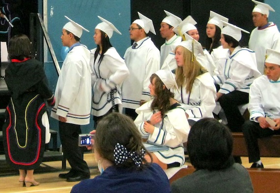 A grad to remember: Inuksuk High School graduates line up to receive diplomas at their June 1 graduation ceremony in Iqaluit. Proud parents, family and friends packed the school gymnasium to see the 40-member graduating class of 2013 reach a milestone in their education. 