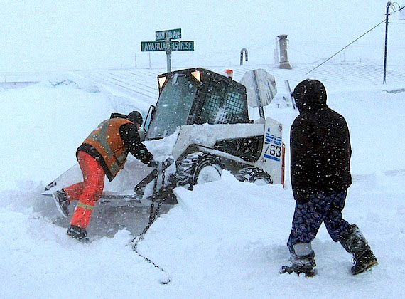 Even a snow plow finds it hard-going in Rankin Inlet's May 16 storm. But blizzard conditions with near-zero visibilities and very high snowfall accumulations are no laughing matter: these were to taper off by midday on May 16, but people were still being told that everyone in Rankin Inlet should stay home. Since May 14, nearly 90 cm of snow has fallen in Rankin Inlet, and Environment Canada said another five to 10 cm of snowfall was likely to fall before the snow ends completely late May 16. Meanwhile, the stormy conditions in the Kivalliq region have hampered search efforts for Michel Pilon, 39, a worker at the Agnico Eagle Meliadine gold mine project, missing since May 14, and Alvin Kannak, a 72-year-old elder from Baker Lake, missing since May 7. Read more about Rankin Inlet's extreme weather and its impact on the search efforts on Nunatsiaqonline.ca. (PHOTO BY DOUG MCLARTY/ARCTECH DESIGN)