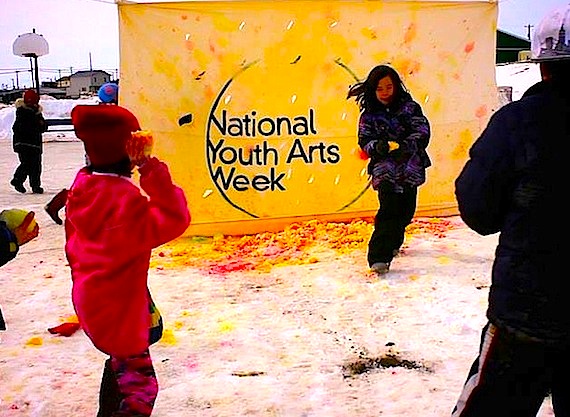 Last May National Youth Arts week started out with a bang in Iqaluit as kids, shown here, decorated a huge canvas with paint balls. (FILE PHOTO)