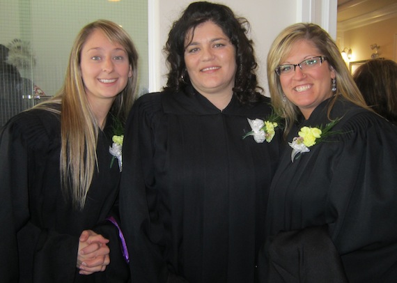 Nunavut Teacher Education Program graduates Cassandra Young, Joanne Peters and Ashleigh Wesley flash happy smiles at their June 6 graduation in Iqaluit. Six students, Sarah Ayaruak of Rankin Inlet, Rosie Joamie of Pangnirtung, Peters of Iqaluit, Wesley of Iqaluit, Young of Iqaluit and Stuart Crose of Iqaluit, received their Bachelor of Education Degrees in a special ceremony with Nunavut Arctic College and the University of Regina. NTEP, in partnership with the University of Regina, offers the NTEP program to prepare Nunavummiut to become teachers in Nunavut schools.  The Nunavut Teacher Education Program starts again this fall at Nunatta Campus in Iqaluit. (PHOTO BY BRIAN MANNING, COURTESY OF NAC)